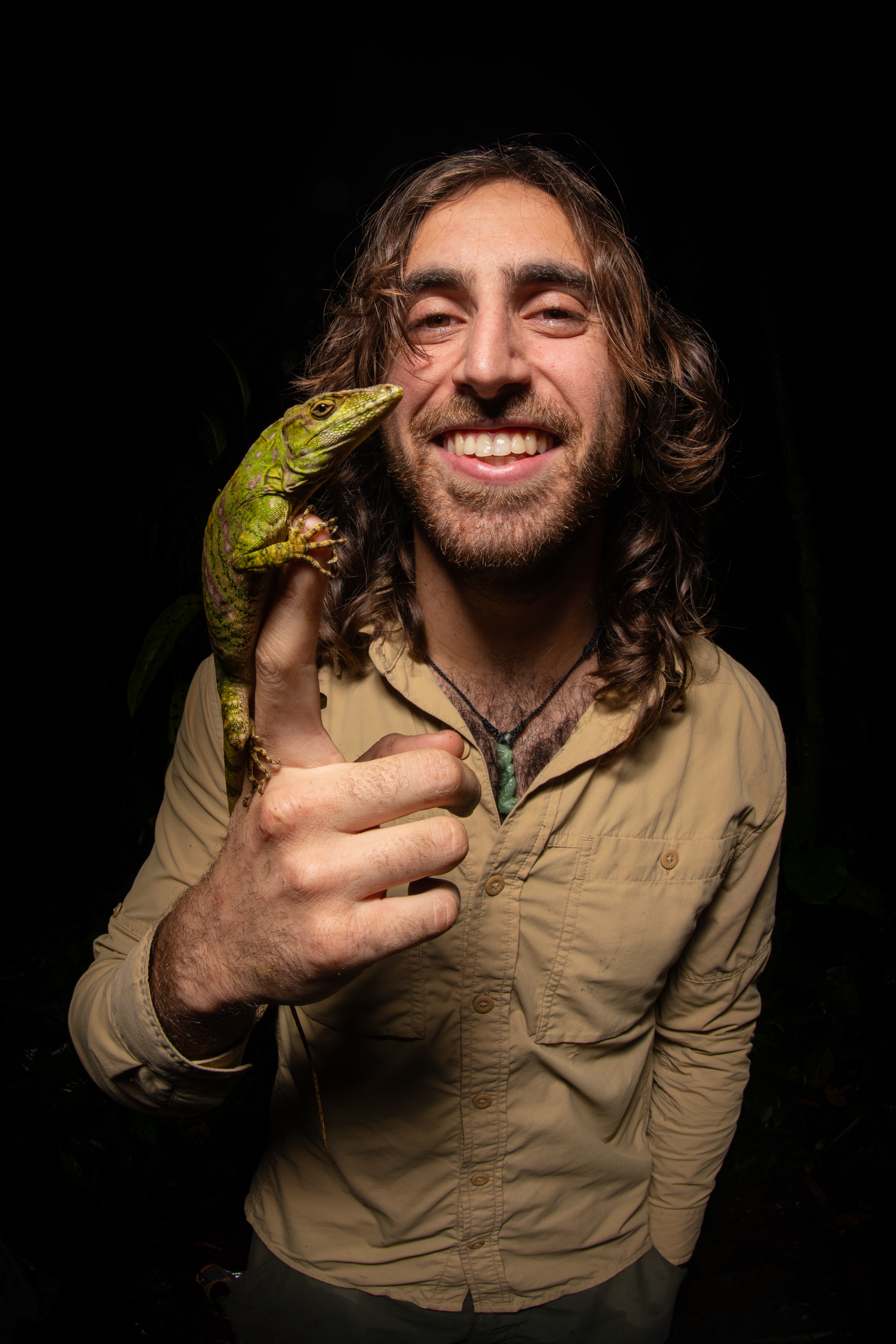 Picture of Taz holding an anole